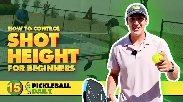 Player hitting a controlled low shot in pickleball to prevent pop-ups